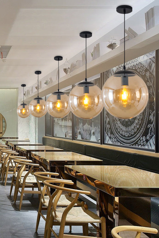 Modern Glass Orb Pendant: Stylish Lighting For Restaurants