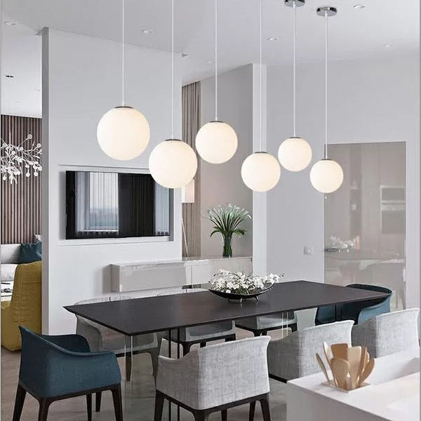 Makayla Elegance Meets Versatility: White Glass Globe Pendant