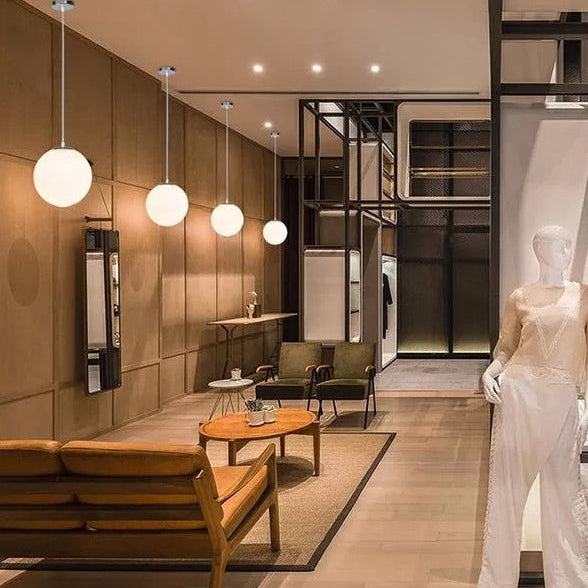 Makayla Elegance Meets Versatility: White Glass Globe Pendant