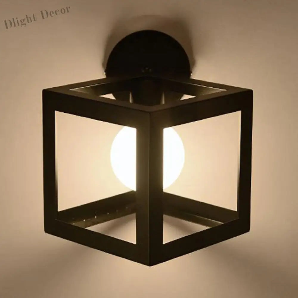 Cyrus - Industrial Chic Wall Sconce With Black Metal Cage