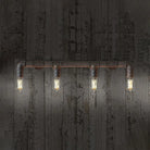 Embrace Industrial Charm And Ample Illumination: The 4 - Bulb Linear Pipe Wall Sconce Rust Wall