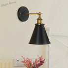 Embrace Industrial Chic With The Black And Brass Conic Sconce Wall Light