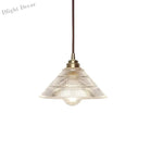 Enhance Your Dining Room With Industrial Elegance: The Brass Cone Pendant Clear Ribbed Glass