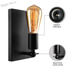 Industrial Charm For Your Dining Room: The Black Wall Lamp With Exposed Bulb