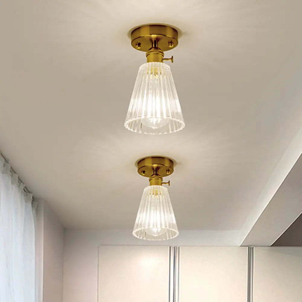 Industrial Chic Meets Modern Versatility: The Clear Glass Single - Light Gold Ceiling Light / A