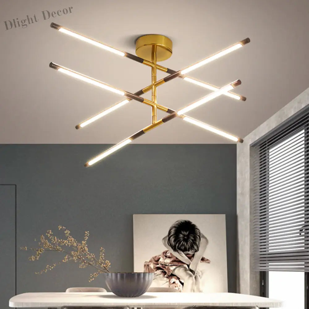 Joanna Elegance Meets Dazzling Illumination: The Black & Gold Linear Chandelier