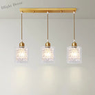 Leilani Modern Brass Pendant: Prismatic Glass Meets Chic Style