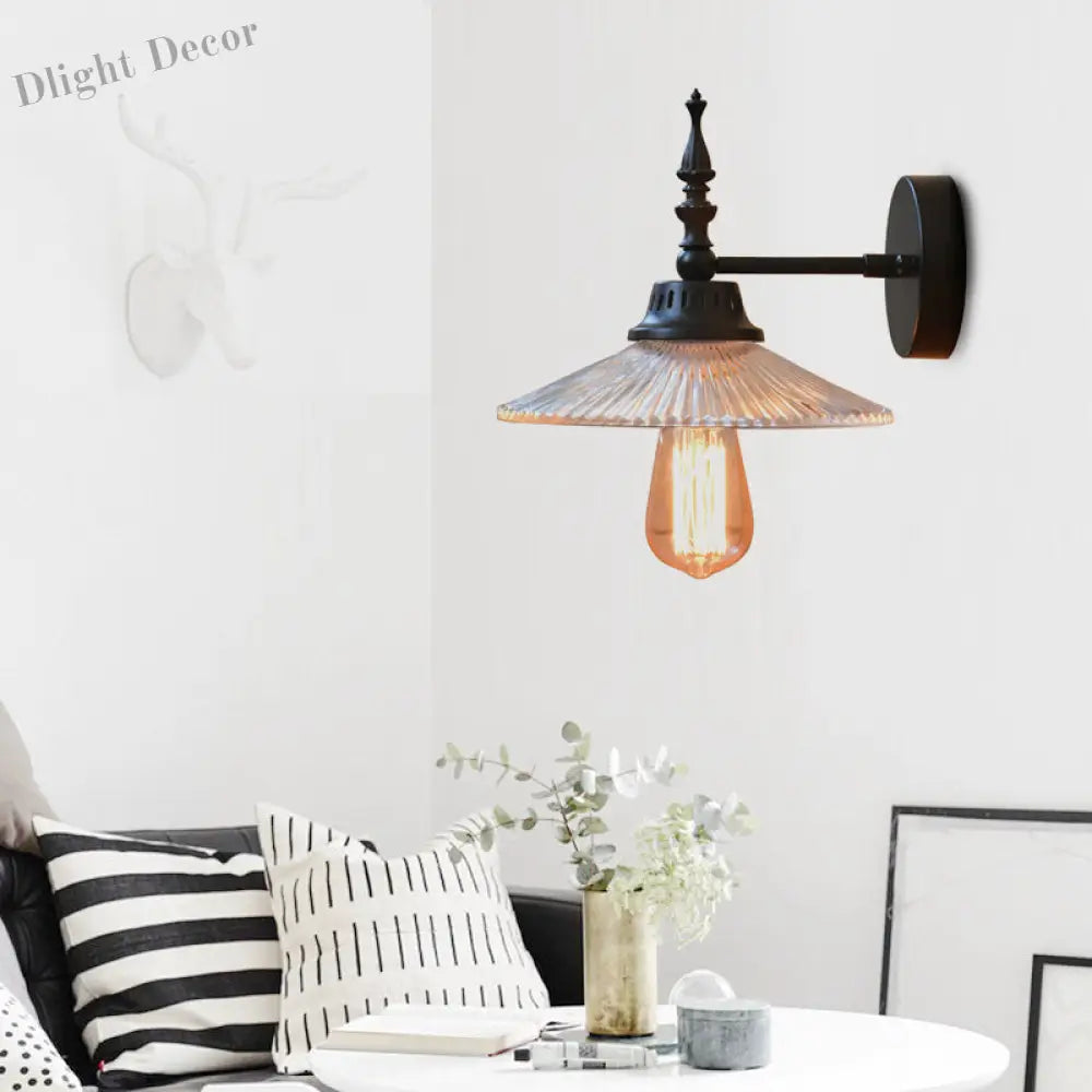 Light Up Your Space With Industrial Chic: The 1 - Light Black Sconce Clear/Green Glass