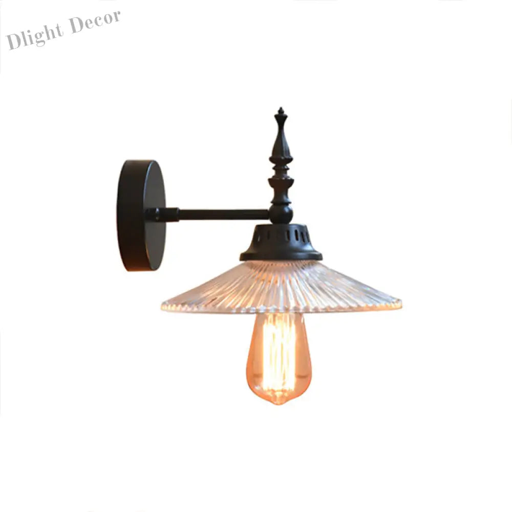 Light Up Your Space With Industrial Chic: The 1 - Light Black Sconce Clear/Green Glass