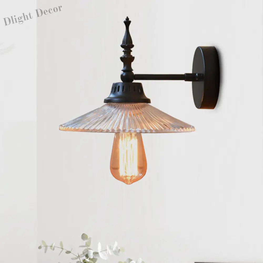 Light Up Your Space With Industrial Chic: The 1 - Light Black Sconce Clear/Green Glass