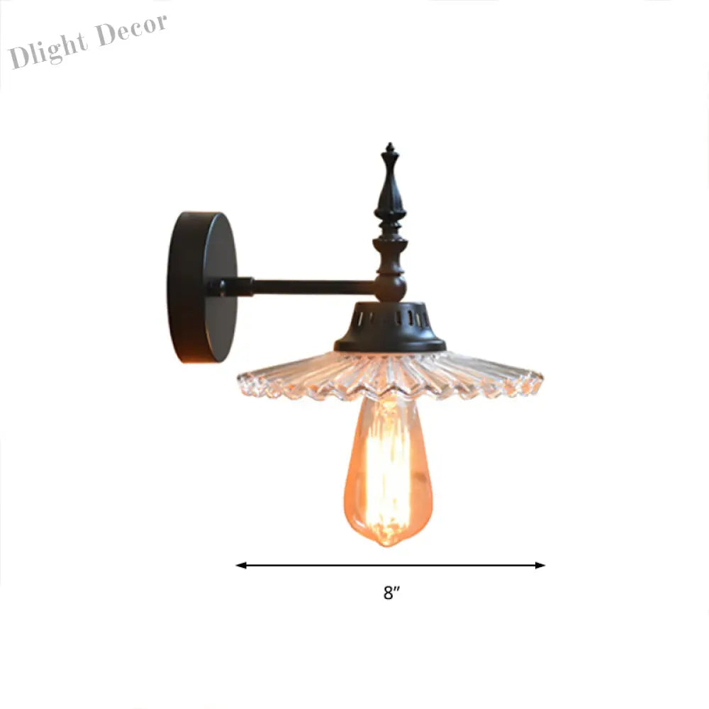 Light Up Your Space With Industrial Chic: The 1 - Light Black Sconce Clear/Green Glass