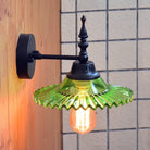 Light Up Your Space With Industrial Chic: The 1 - Light Black Sconce Clear/Green Glass Green / Wide