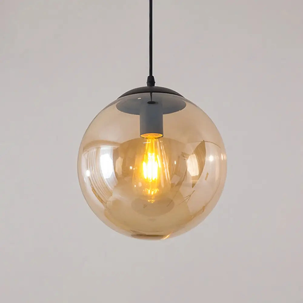 Modern Glass Orb Pendant: Stylish Lighting For Restaurants Amber / 5’