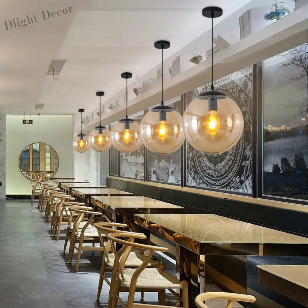 Modern Glass Orb Pendant: Stylish Lighting For Restaurants